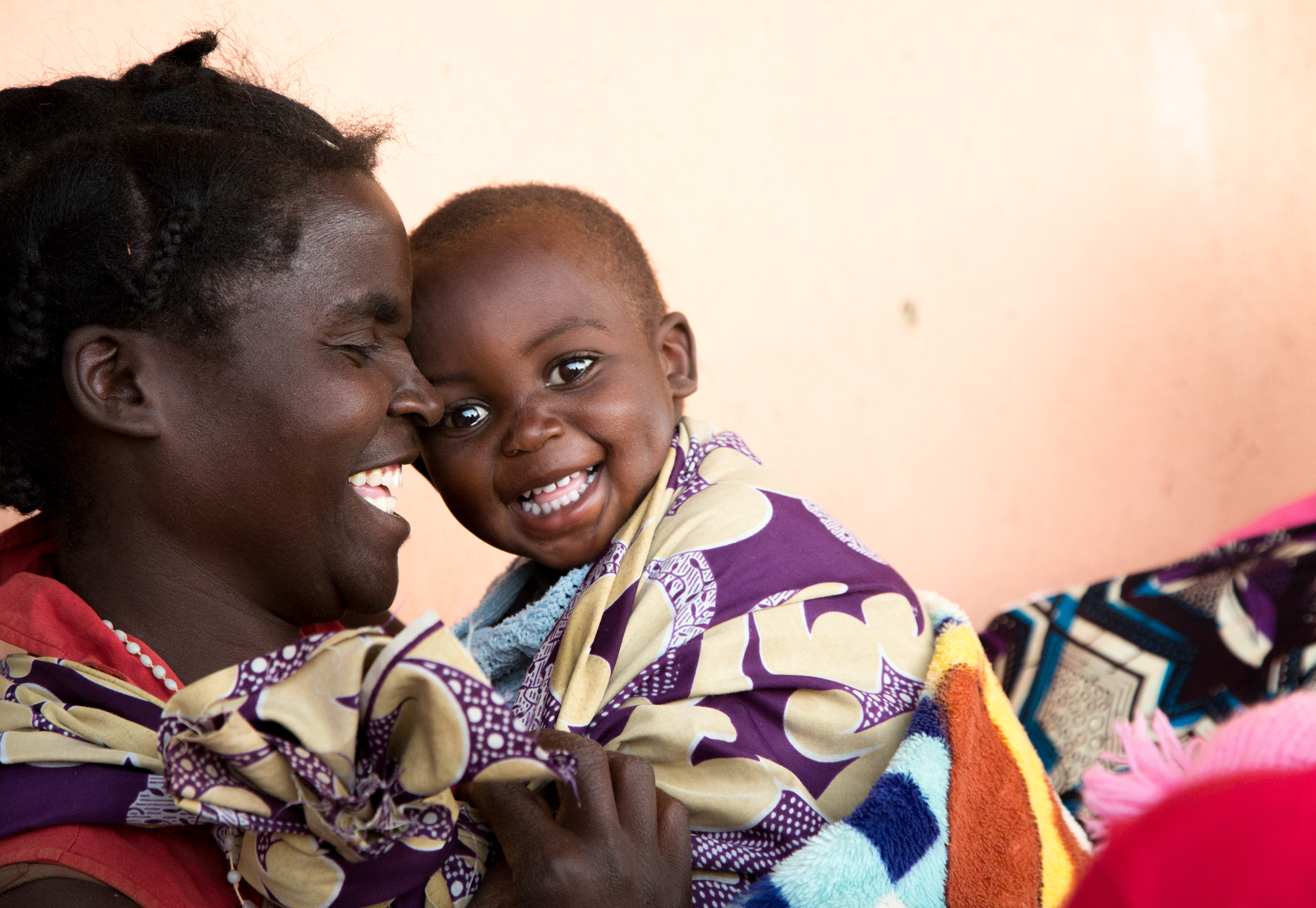 Woman and Child near Health Clinic