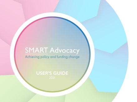 Cover page of the SMART Advocacy User's Guide. Cover image is a colorful wheel with the text title in the center.